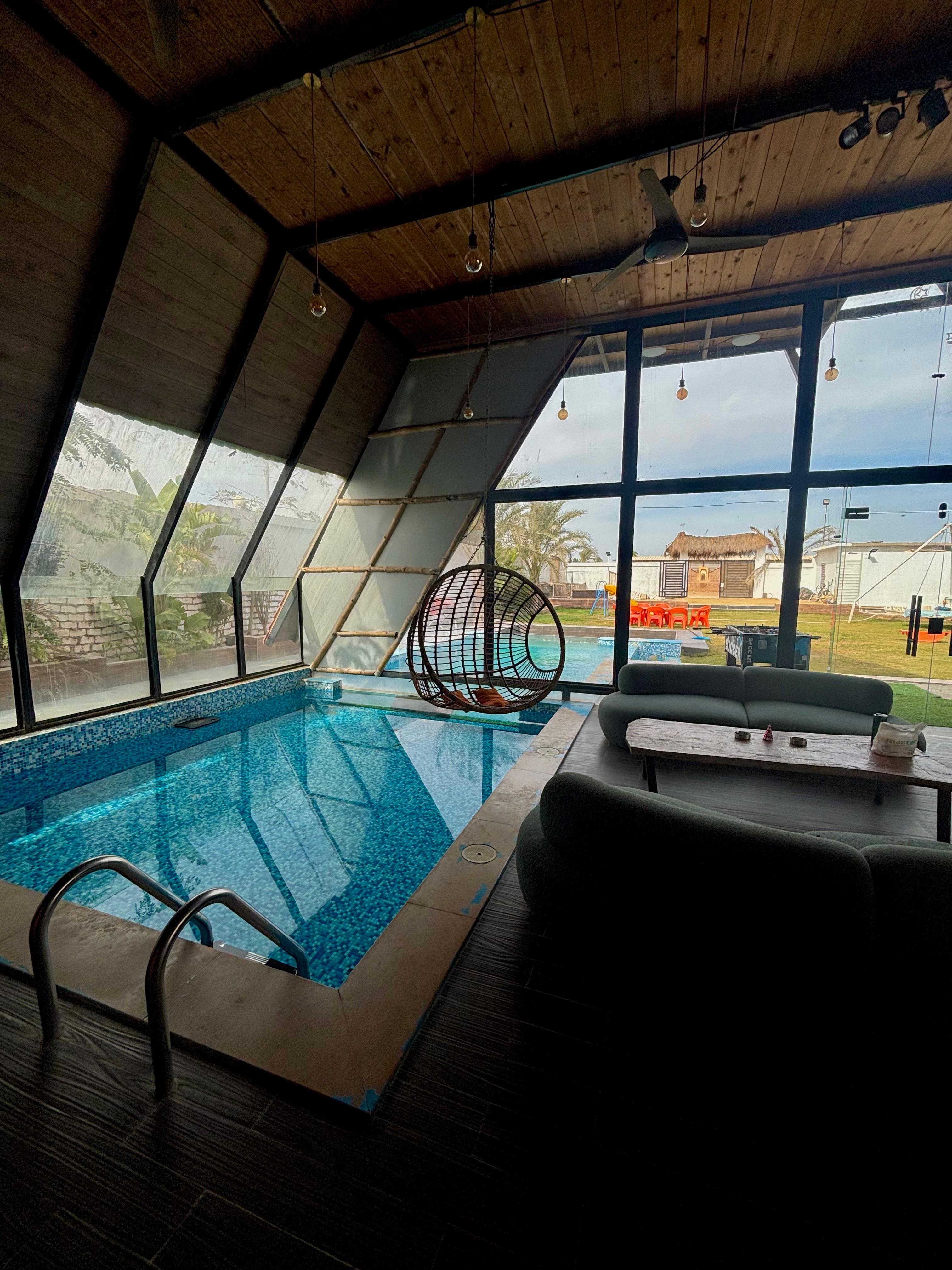 Atmospheric indoor pool with ambient lighting